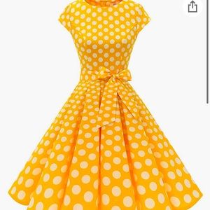 Yellow w/ white polka dots. Gabby gabby costume